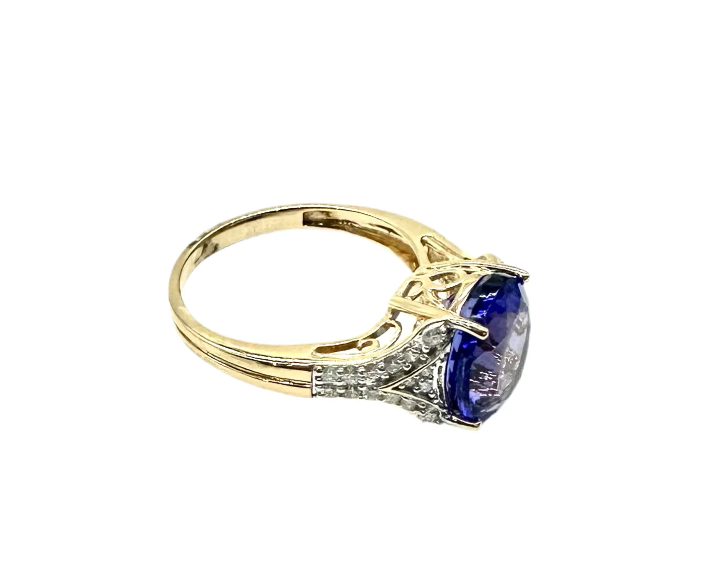 4 Carat Tanzanite 1/2ctw Diamond Ring