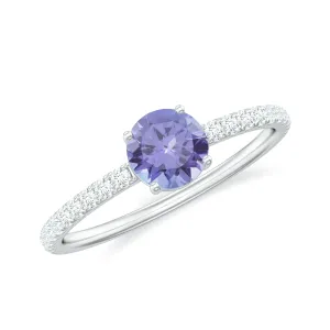 Classic Ring with Tanzanite Solitaire and Diamond Side Stones