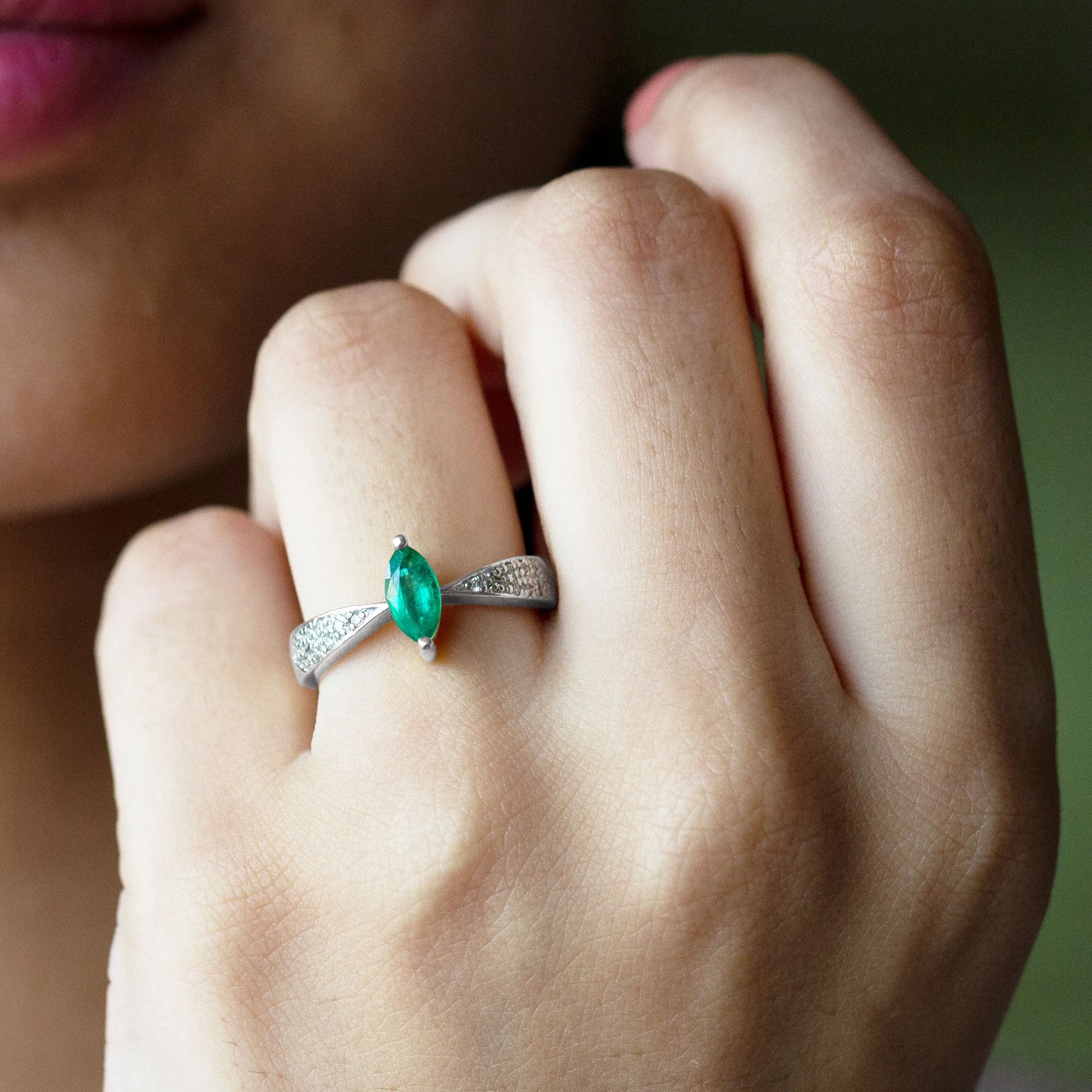 Marquise Cut Emerald Solitaire Ring with Diamond Accent