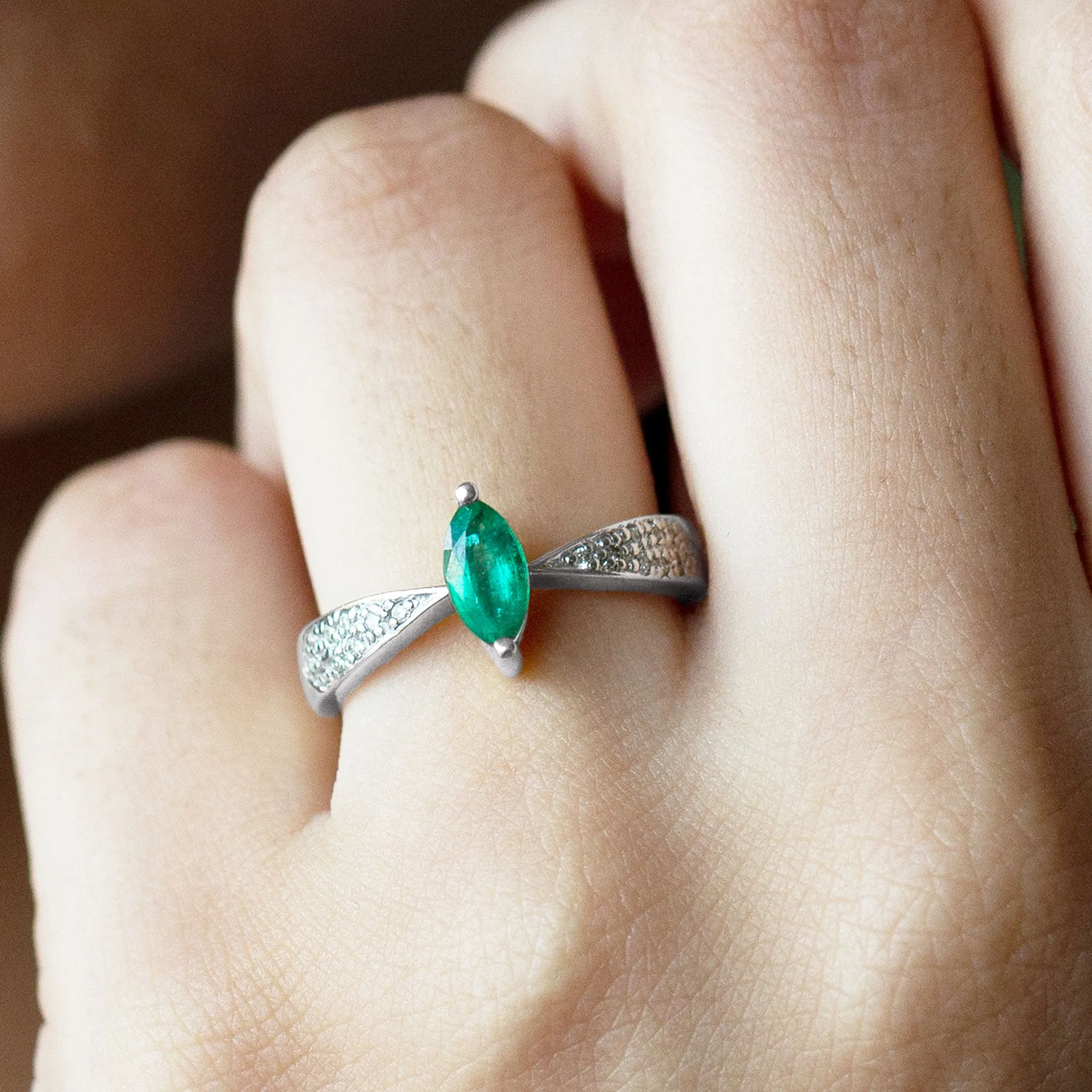 Marquise Cut Emerald Solitaire Ring with Diamond Accent