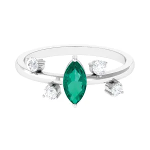 Minimal Marquise Emerald Solitaire Ring with Diamond