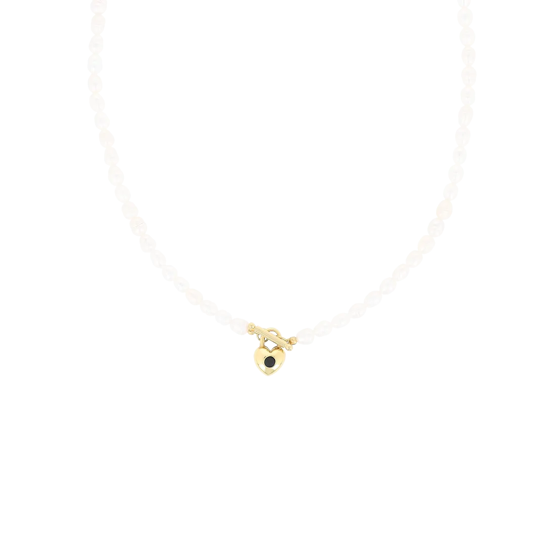 Pearl necklace with gold coloured heart shape closure