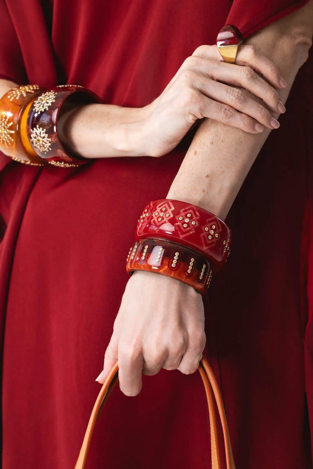 White Topaz Orange Red Bakelite Bangle